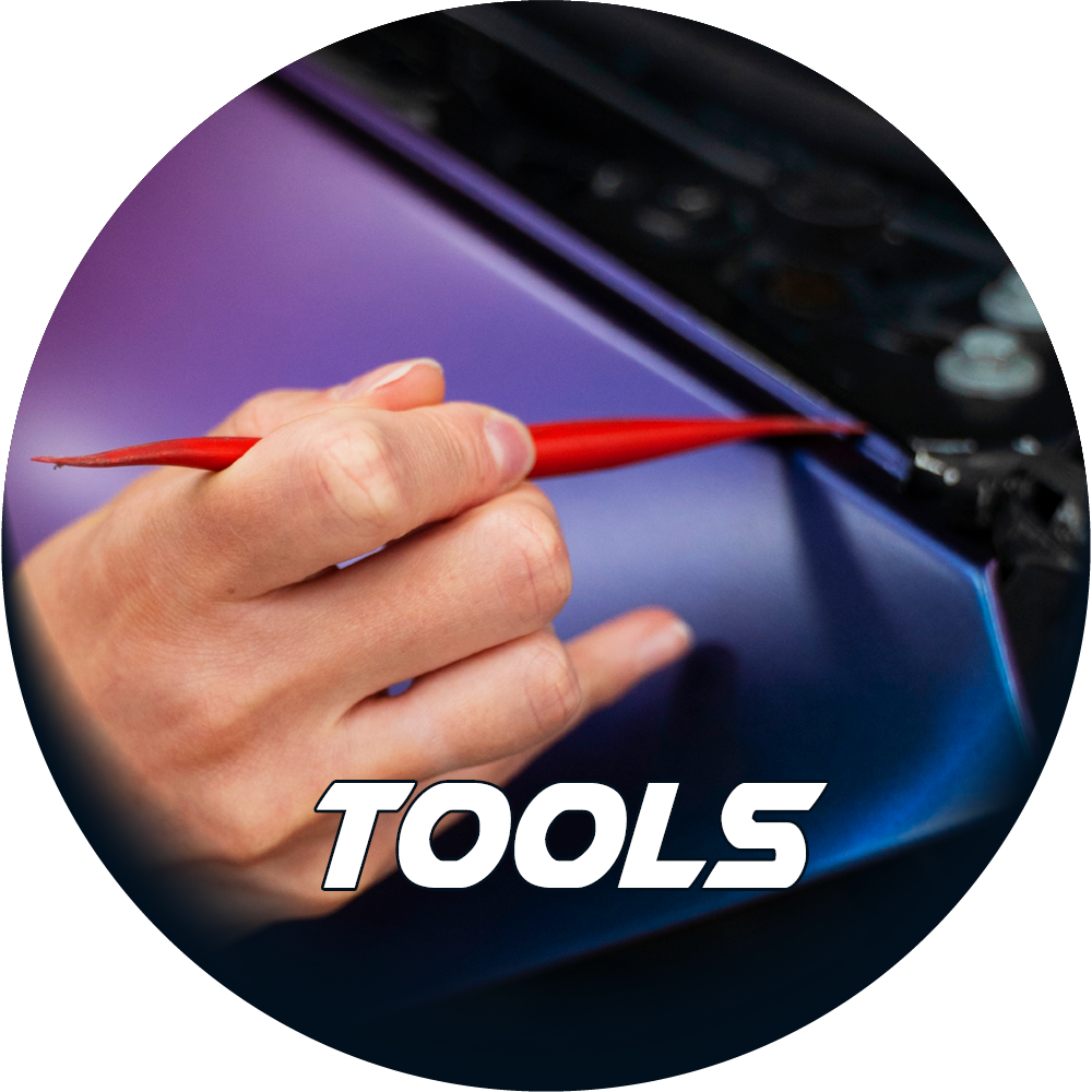 Wrap Tool installing Wrap Film on a door with 'Tools' Text overlay 